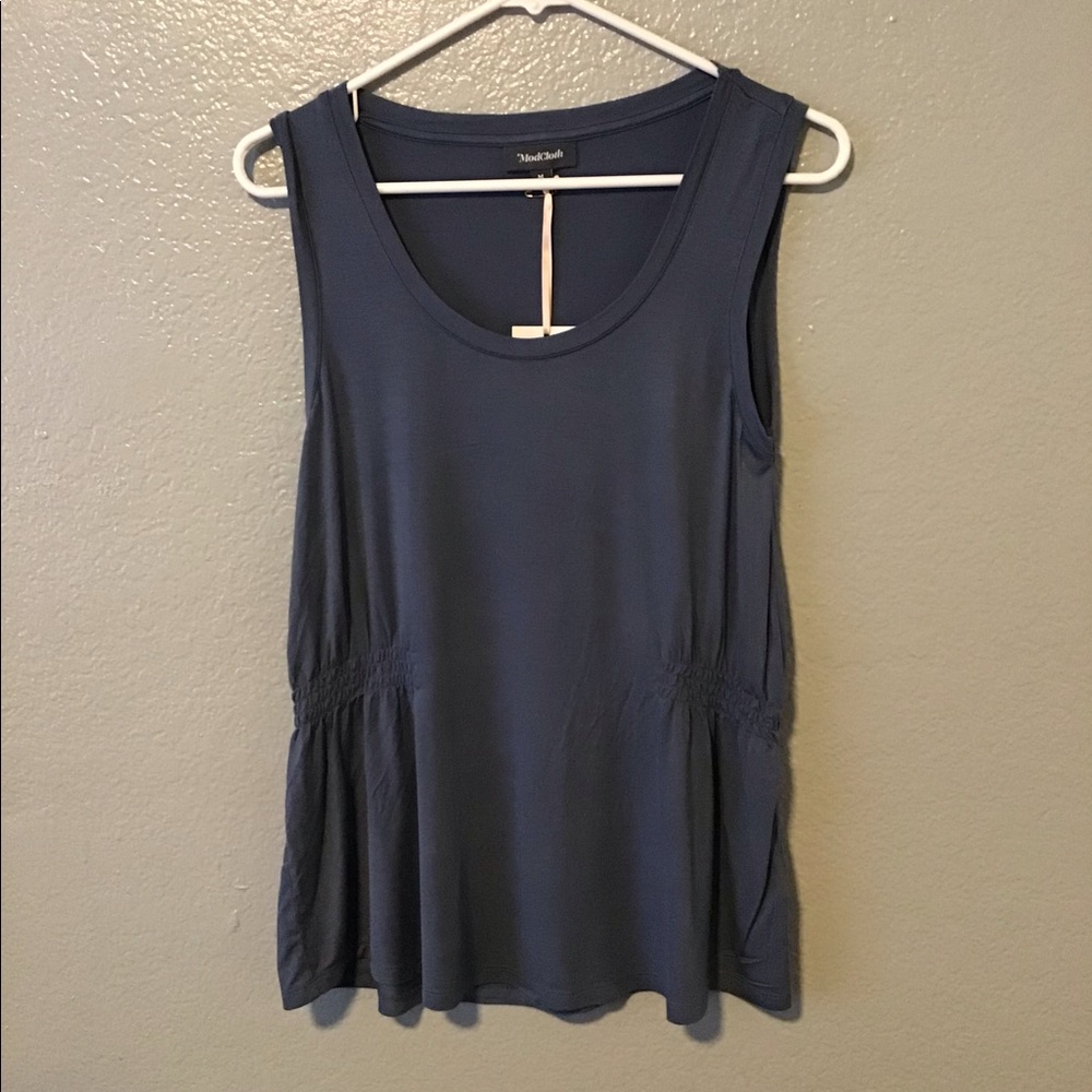 - ModCloth Sleeveless Blouse.  NWT